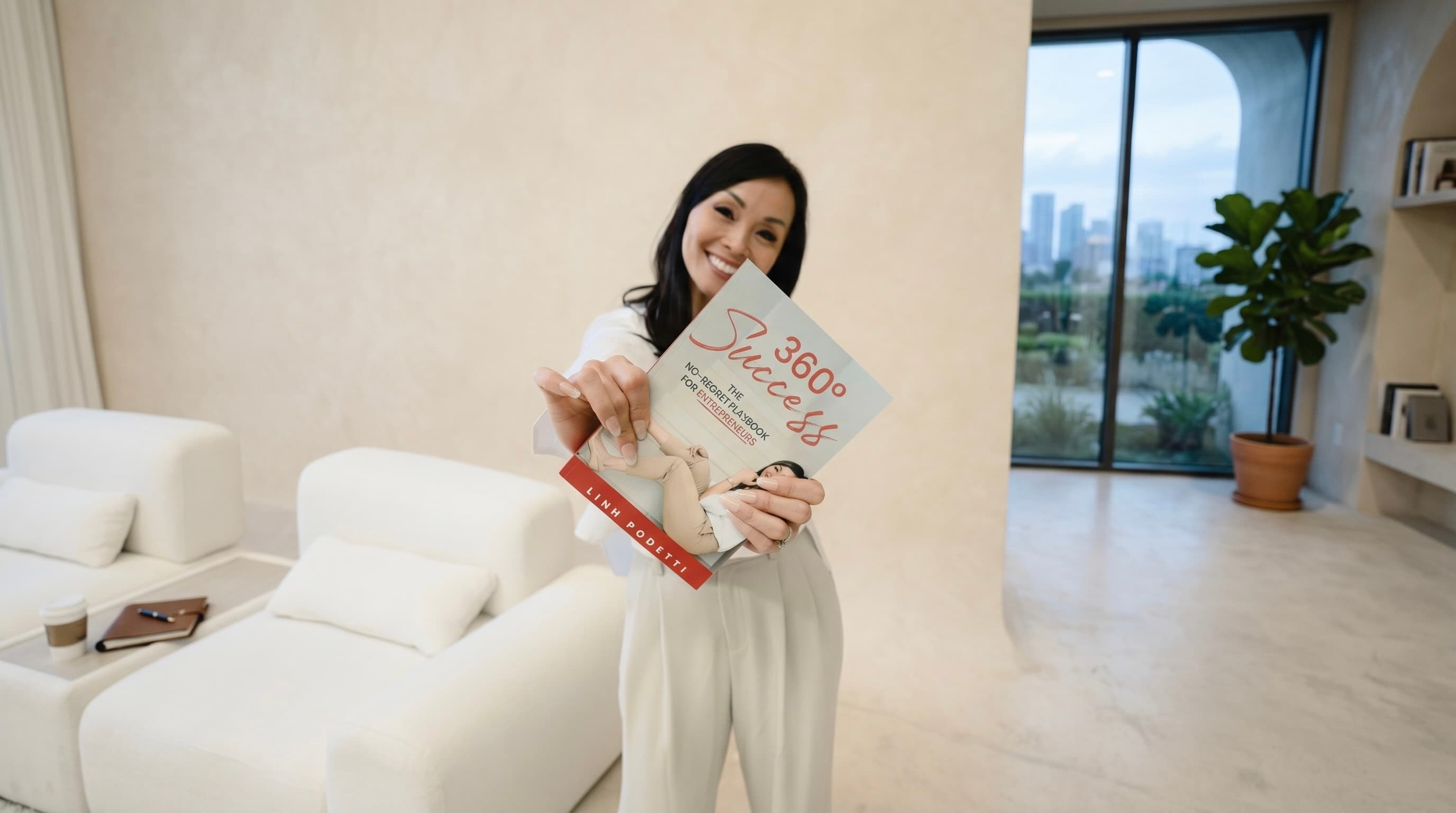 Linh Podetti's books: 360° Success and 40 Productivity Hacks side-by-side